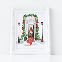 Framed artwork of a woman in a red dress standing in front of a decorated archway with Christmas wreaths.